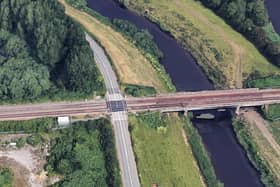 The car crashed off the road and into the River Don near Thorpe Bank Level Crossing.