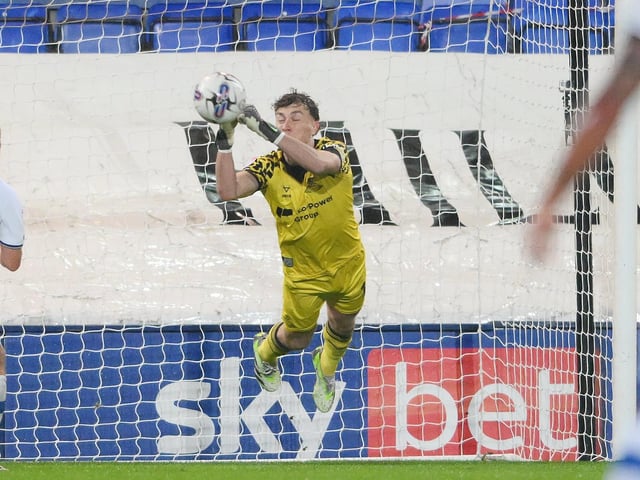 Made a big save down low to deny Grimsby's Gavan Holohan in the first half.