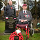 Ben Parkinson and Paul Bristow, pictured by the grave of Stanislaw Wadas. Picture: NDFP-10-11-20-WW2Hero 3-NMSY