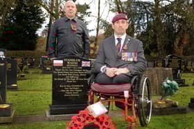 Ben Parkinson and Paul Bristow, pictured by the grave of Stanislaw Wadas. Picture: NDFP-10-11-20-WW2Hero 3-NMSY