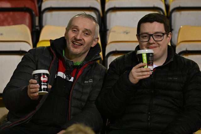 Doncaster Rovers fans watch their side's battling draw at Bradford.