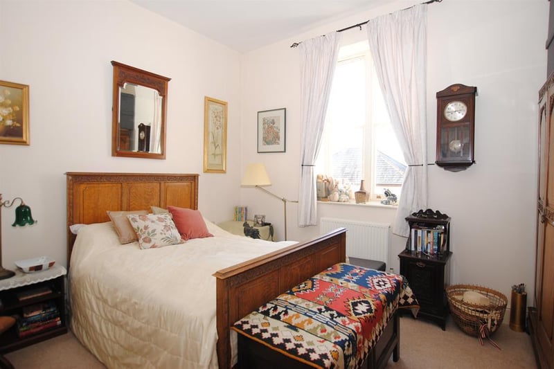 The spacious townhouse features many original period features including high ceilings and double sash windows