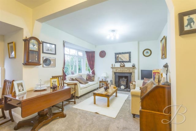 First port of call on our tour of the Ollerton property is this warm and homely living room. Its main focal point is a feature fireplace, but the whole room is comfortable and relaxing in equal measure.