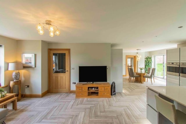 Stylish open plan living within the house, that has underfloor heating.