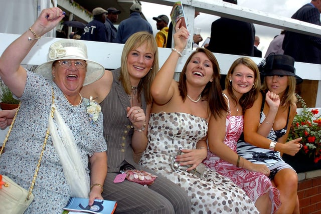 Pictured at the St Leger Festival Ladies' Day are, from left, Mary Staniforth, aged 59, of Mexborough, Laura Carnell, aged 19, of Doncaster, Rachael Brady, Catherine Noble and Georgina Mackey, all aged 19, of Bessacarr. Picture: Steve Taylor, Sheffield Newspapers