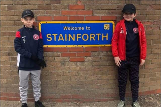 Logan and Jimi Lee took on a ten mile walk to raise £1,000.