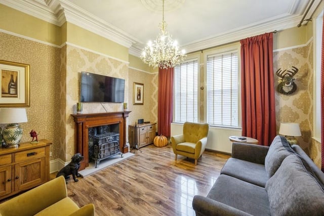 Reception rooms display period decorative detail, with log burner stoves supplying cosy warmth.