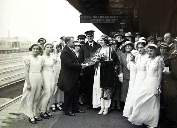 The 1935 Railway Queen and her retinue are greeted at Doncaster Station by the Mayor
