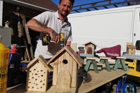 Paul Cook making some of the items he is creating in his front garden in Doncaster