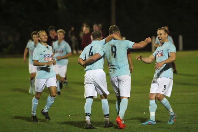 Doncaster City's players celebrate a goal during their victory against Jubilee Sports. Photo: Steve Pennock