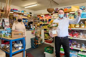 Mecca Community Champion Lee Mason pictured at his shop Armthorpe Pet and Garden Supplies with Mecca Bingo General Manager Michelle Winfield