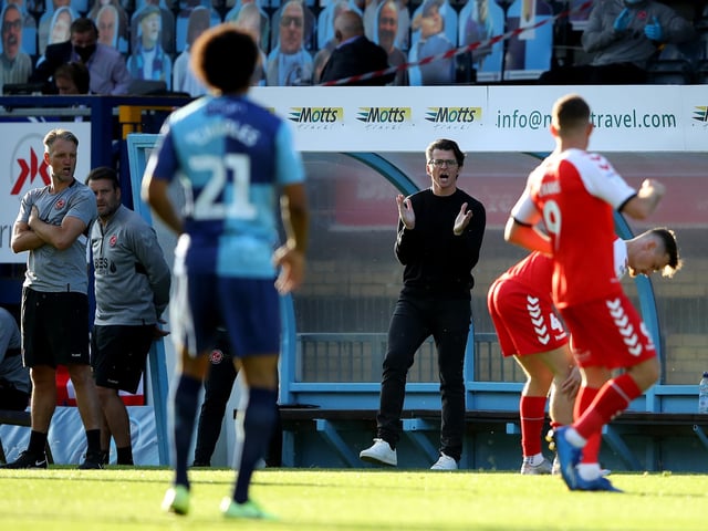 Career win percentage: 38%. Number of games at current club: 100.