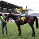 Jockey Paul Townend celebrates following his victory with Al Boum Photo in last year's Gold Cup. Photo by Michael Steele/Getty Images