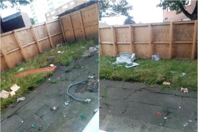 The estate is littered with piles of rubbish.