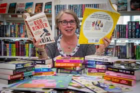 Fiona from Harworth and Bircotes Library receiving the new books donated by Barratt Homes.