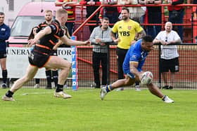 Dons' Jason Tali scores the second try at Dewsbury.