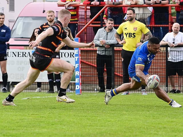 Dons' Jason Tali scores the second try at Dewsbury.