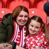 Doncaster Rovers put one foot in League One with a convincing win over Colchester United.
