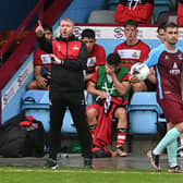 Grant McCann gets his message across from the touchline.