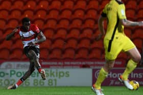 Doncaster's Ma Faal scores the opening goal against Burton Albion which helped secure top spot in Northern Group H of the Bristol Street Motors Trophy. Rovers Now face Nottingham Forest U21 on Tuesday, December 5, kick-off 7pm. (Picture by Howard Roe/AHPIX.com)


Doncaster's Ma Faal Scores the opening goal