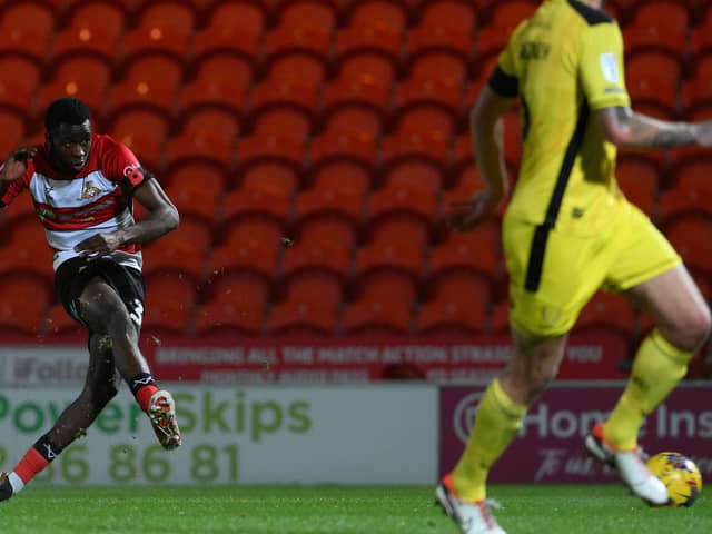 Doncaster's Ma Faal scores the opening goal against Burton Albion which helped secure top spot in Northern Group H of the Bristol Street Motors Trophy. Rovers Now face Nottingham Forest U21 on Tuesday, December 5, kick-off 7pm. (Picture by Howard Roe/AHPIX.com)


Doncaster's Ma Faal Scores the opening goal