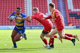 Dons' Reece Lyne drives forward with the ball. Picture: Andrew Roe/AHPIX LTD