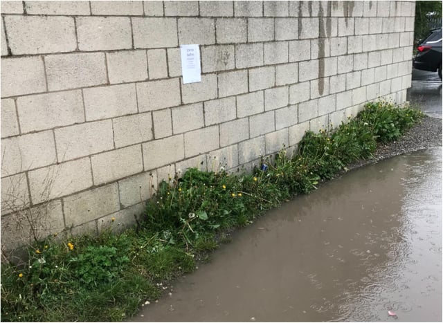The huge dirty puddle was dubbed 'Stainy Baths' by a prankster.
