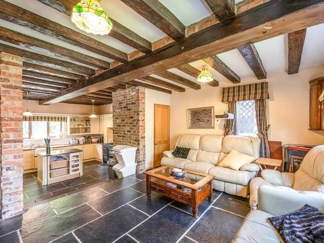 An open plan style kitchen with living room.