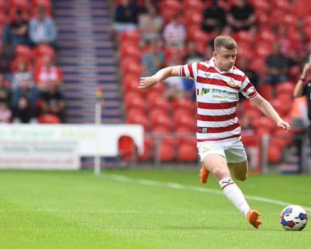 Doncaster's James Maxwell in action against Sutton United. Photo: Howard Roe.