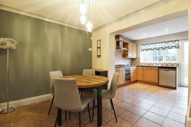 An open plan style dining room through to kitchen.