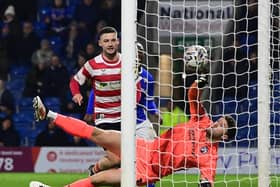 Luke Molyneux see his shot cleared off the line by Max Thompson in the Chesterfield goal.