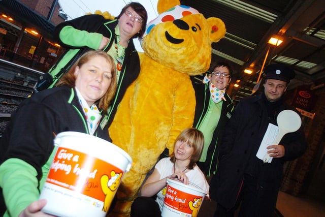 Pudsey bear was met at Doncaster train station as he toured Adsa stores  in 2008to raise money for Children In Need. With him L-R are Charlotte Hankinson, of Doncaster store, Elaine Young, of Hull Kingswood store, Lisa Wharton, of Carcroft store, Kassy Dermody, of Hull Kingswood store, and John Graham, of National Express.