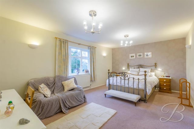 The first bedroom we look at is the master. It could hardly be a better size with space for sofa and dressing table or desk. It also has its own en suite and dressing room, adding a touch of high living!