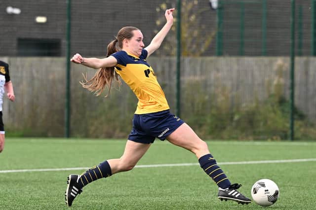 Belles' Izzy Gigg scores her team's only goal in last weekend's defeat at home.