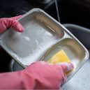 Tray being washed.