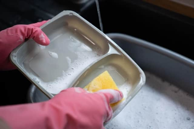 Tray being washed.