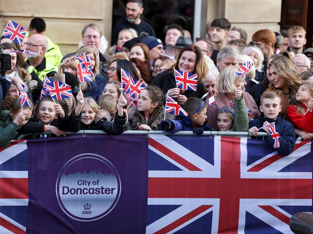 People wait for King Charles and Queen Consort Camilla's visit to the Mansion House in Doncaster during an official visit to Yorkshire on November 9, 2022. (Photo by Molly Darlington - WPA Pool/Getty Images)