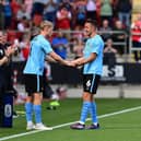 Richard Wood (right) has not featured for Rovers since way back in August.