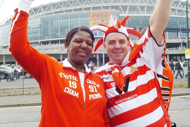 Rovers fans Leslie Dlamimi, of Doncaster and Dave Haith, of Bentley, on Wembley Way