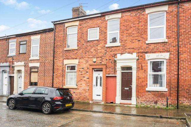 This extended, two-bedroom, mid-terrace house is on the market for £100,000 with Purplebricks.