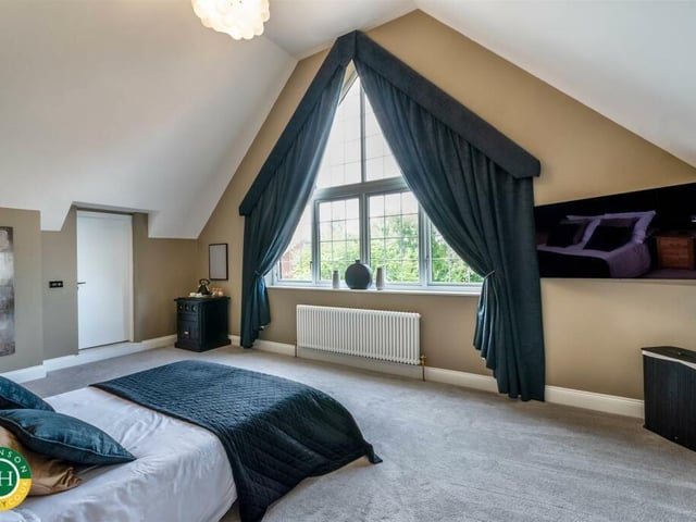 One of five individually styled bedrooms.