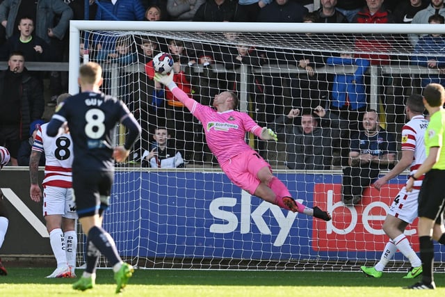 Got caught dallying in possession with Ro-Shaun Williams but made a few saves to keep Gillingham at bay, most notably tipping a header onto the bar.