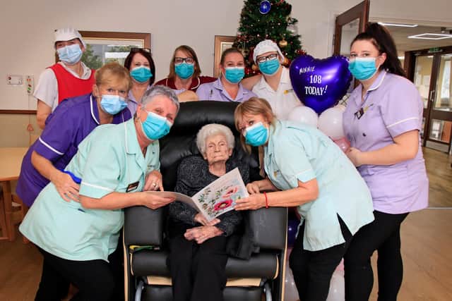 Minnie Liddle, pictured celebrating her 108th birthday at Oldfield House Care Home in Stainforth. Minnie is pictured with care home staff members, back l-r Sue Bingham, Mandy Prior, Gail Woods, Sue Courtney, Kerry Rumney, Lindsay Allott, Claire Swanborough. Front l-r Caroline Baker and Maggie Brookes.