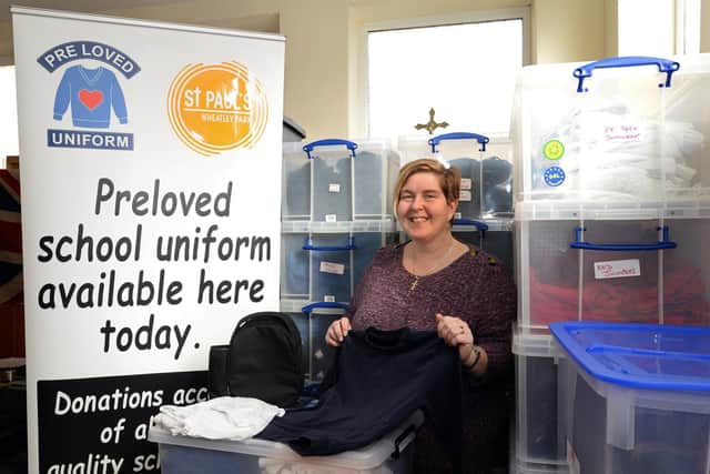 Tracey Leigh, pictured at St. Paul's Community Church, with some of the Uniforms that have been collected. Picture: NDFP-25-02-20 Preloved Uniform 1-NMSY
