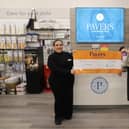 Pavers has presented a £1,000 cheque to St John's Hospice.
