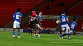 Mo Faal has a shot at goal.