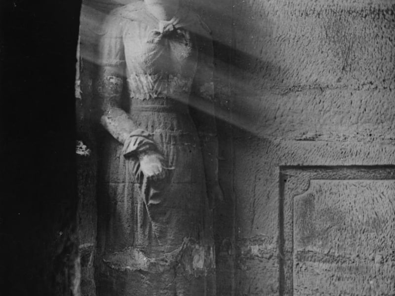 A carving of Biddy, an Irish woman. This carving is about three meters tall.