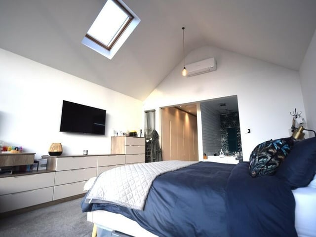 Another of the property's five bedrooms.