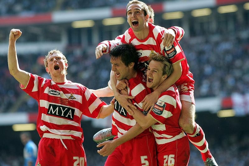 Doncaster Rovers captain Graeme Lee is mobbed by team mates after scoring the third Doncaster goal during their Johnstones Paint Trophy Final win against Bristol Rovers on April 1, 2007 in Cardiff.