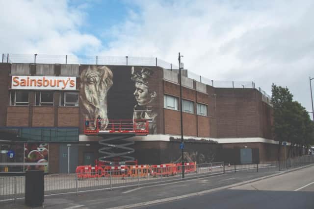 The mural is located by the Doncaster train station.
Photo by: Street Art Atlas.